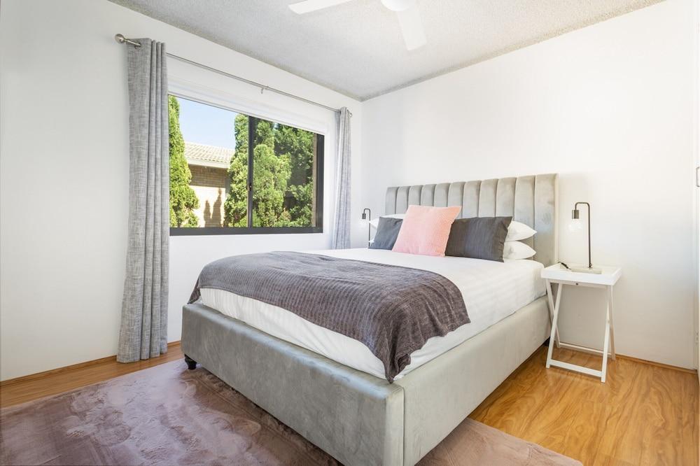 Unit With Balcony, Backyard and Parking Near Shops - Tap to explore photos