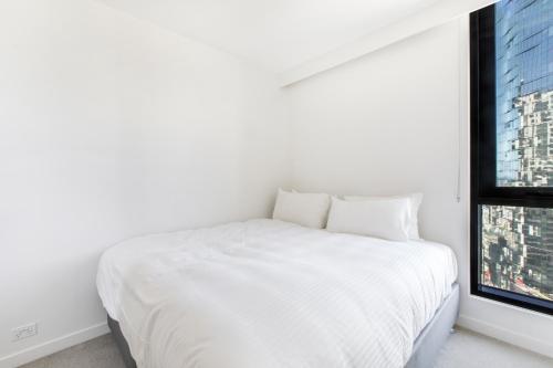 Modern Nomads Spacious Modern 2BR Urban Retreat with View - Tap to explore photos