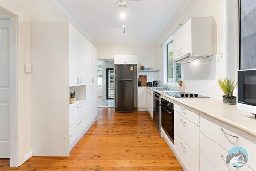 Spacious 4-Bed Family Home in North Ryde - Tap to explore photos