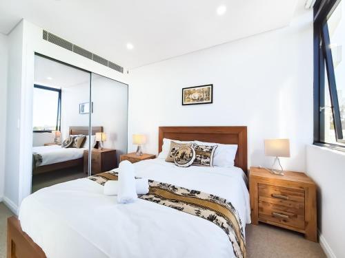 Relaxing 1BR w Pools & SPA, Gym in Olympic Park