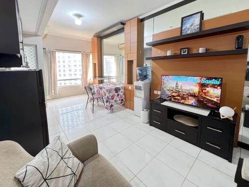 Cozy 2BR Sudirman Apt with Pool, Wi-Fi, & Netflix by 2ndHome - Tap to explore photos