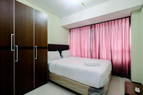 Elegant Nifarro Park 2BR Apartment with Best View By Travelio