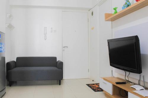 Beautiful and Comfy 1BR at Bassura City Apartment By Travelio - Tap to explore photos