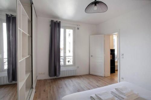 Appartement Design Saint-Mandé, proche Paris et bois - Tap to explore photos