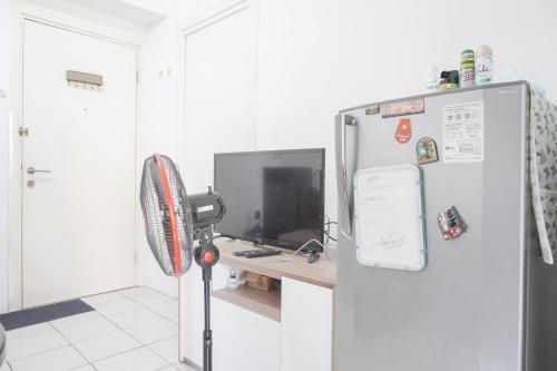Best Deal and Comfy 2BR at Green Pramuka City Apartment By Travelio - Tap to explore photos