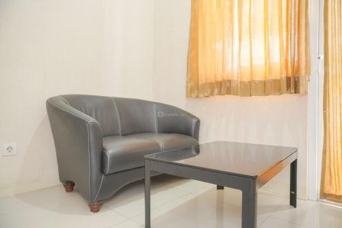 Cozy 2BR Green Pramuka City Apartment near Shopping Mall By Travelio - Tap to explore photos