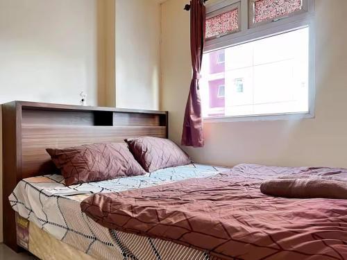 2BR Apt Green Pramuka with Pool & Wi-Fi by 2ndHome