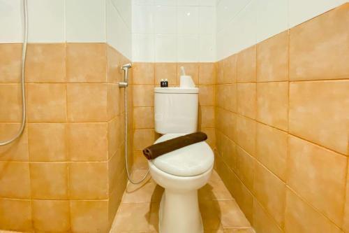 Good Choice and Homey 2BR at Green Pramuka City Apartment By Travelio - Tap to explore photos