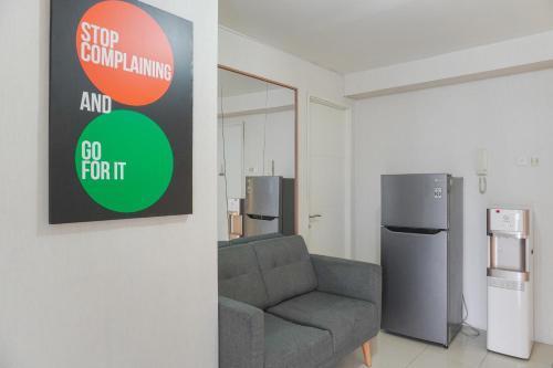 Elegant and Comfy 2BR above Mall at Bassura City Apartment By Travelio - Tap to explore photos