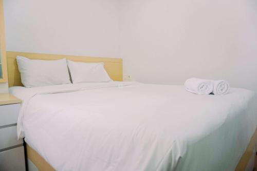 Warm and Cozy Stay 2BR Belmont Residence Puri Apartment By Travelio - Tap to explore photos