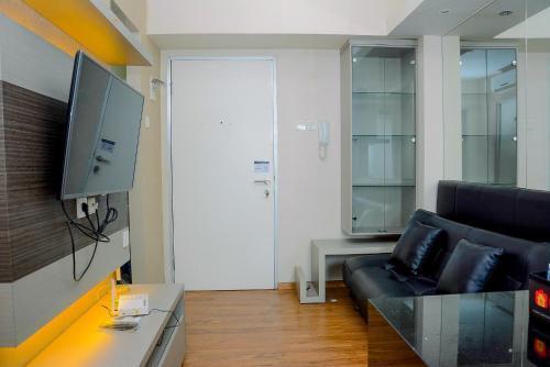 Sea View 2BR Apartment at Green Bay Pluit By Travelio - Tap to explore photos