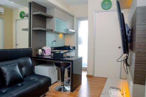 Sea View 2BR Apartment at Green Bay Pluit By Travelio - Tap to explore photos