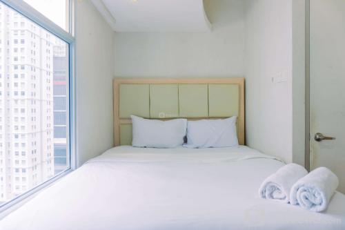 Cozy Stay and Tidy 1BR Green Bay Pluit Apartment By Travelio