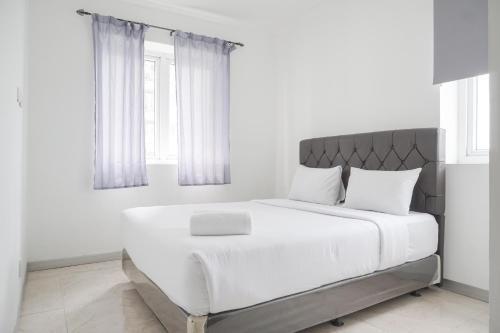 Nice and Cozy 3BR at Grand Palace Kemayoran Apartment By Travelio - Tap to explore photos