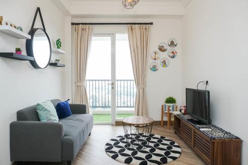 Modern 1BR Apartment at Signature Park Grande By Travelio - Tap to explore photos