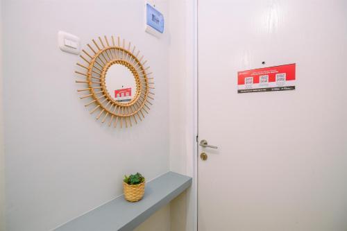 Great Choice and Cozy 2BR at Green Pramuka City Apartment By Travelio - Tap to explore photos