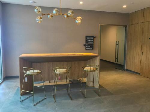 Nice Studio Apartment at Ciputra World 2 By Travelio - Tap to explore photos