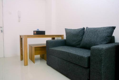 2BR Fully Furnished Minimalist Bassura City Apartment By Travelio - Tap to explore photos