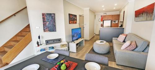 Stylish Split-Level Penthouse Loft with Parking - Tap to explore photos