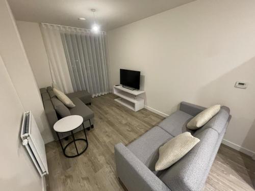 Modern 1-Bedroom Apartment in Wembley Park - Tap to explore photos
