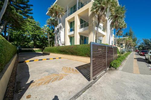 Karon Beachfront Apartment 703 - Tap to explore photos