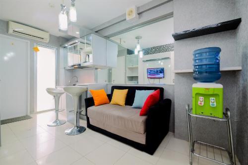 Comfy and Strategic 2BR Apartment at Bassura City By Travelio - Tap to explore photos