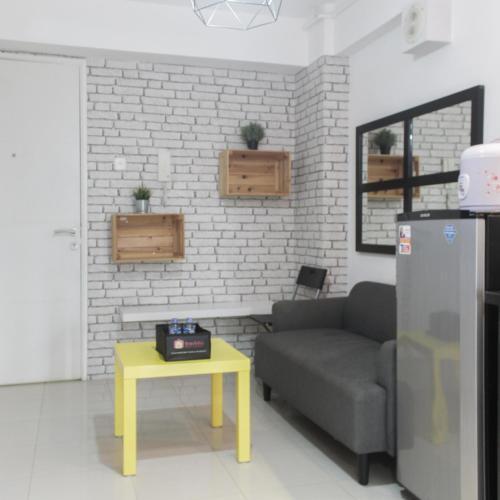 Minimalist and Enjoy 2BR at Bassura Apartment near Bassura Mall By Travelio - Tap to explore photos