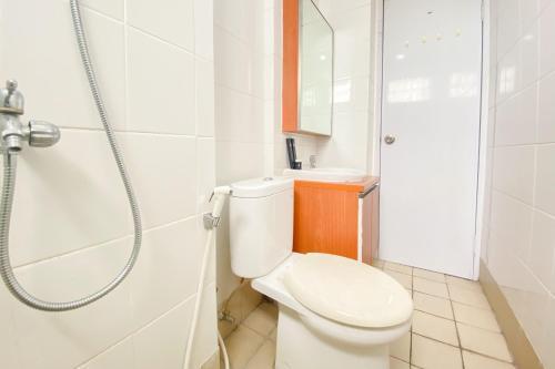 Nice Comfortable 2BR Apartment at Bassura City By Travelio - Tap to explore photos