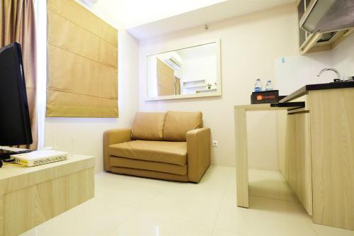 Easy Access to Mall 2BR Green Pramuka City Apartment By Travelio - Tap to explore photos