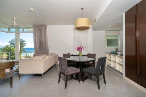 Karon Beachfront Apartment 724 - Tap to explore photos