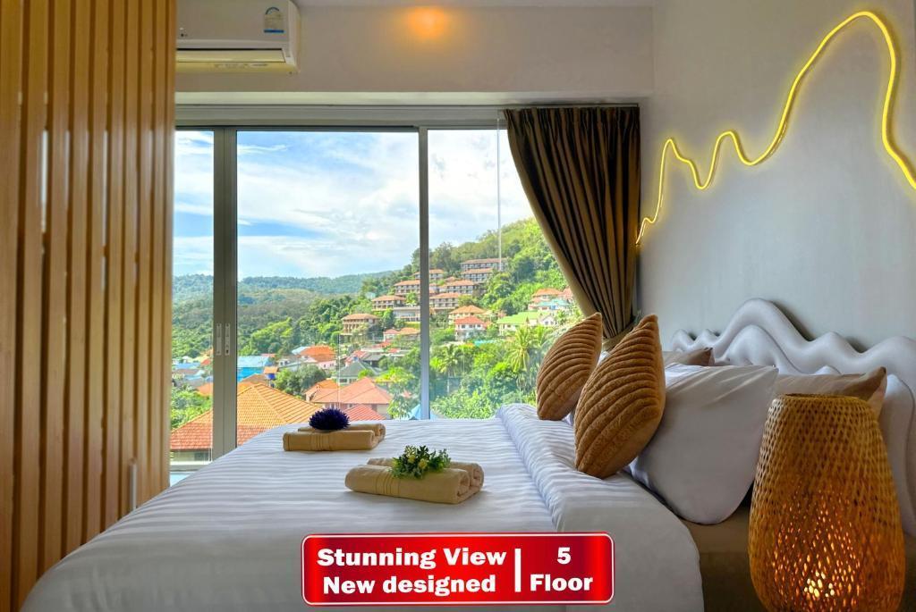 Panoramic Condo 50 sqm Karon - Tap to explore photos