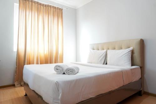 Simply 1BR Grand Palace Kemayoran Apartment By Travelio