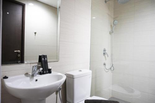 Best Location 2BR Ciputra International Apartment By Travelio - Tap to explore photos