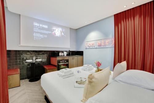 Magnifique Studio 2P avec Jacuzzi et Cinema - Tap to explore photos