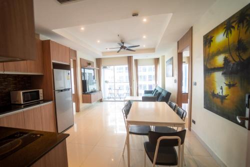 Large 2BR 2BA Condo by the Beach - Tap to explore photos