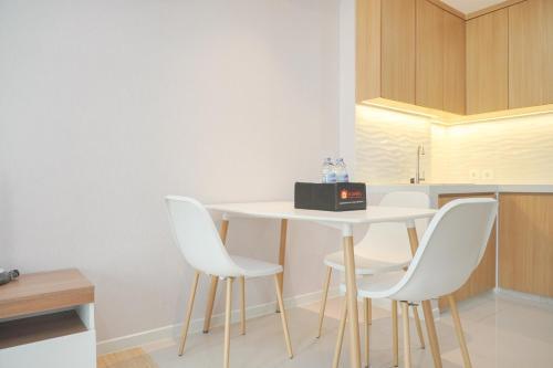 Brand New and Comfy Studio at Daan Mogot City Apartment By Travelio - Tap to explore photos
