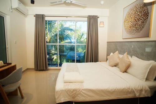 YUVi Blue Guesthouse at Himmafushi Room Type - Deluxe Double or Twin Room with Balcony