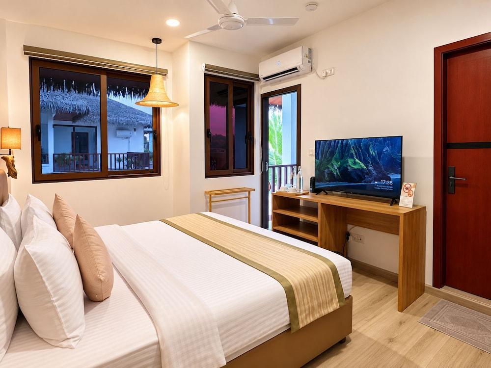 Cocomo Maldives Room Type - Deluxe Double Room with Private Balcony
