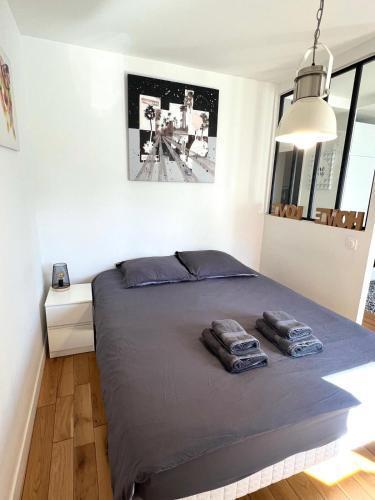 Cosy Appartement - 200m de Paris - Tap to explore photos
