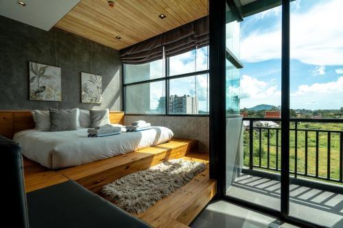 Studio Sora Rooftop Pool ReLife Nai Harn Beach - Tap to explore photos