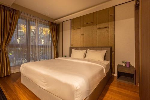 Panora Surin by Holy Cow, 1-BR, courtyard view - Tap to explore photos