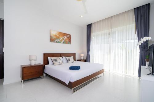 2 Bedrooms Villa in Rawai - v6 t - Tap to explore photos