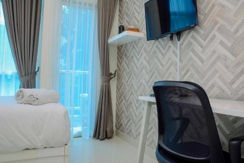 Best Location and New Furnished at Studio Apartment Capitol Park Residence By Travelio - Tap to explore photos