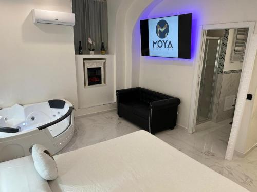 Moya Suites 2 - SPA in Camera - Tap to explore photos