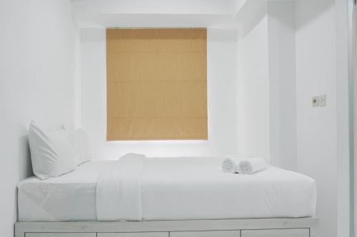 Comfort Studio at Menteng Square Apartment By Travelio