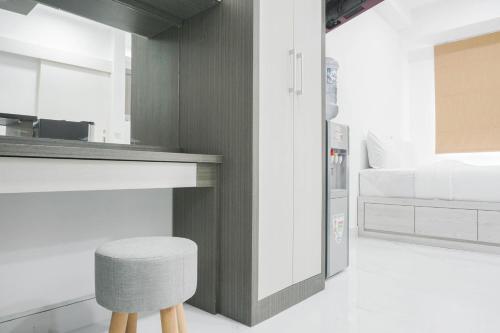 Comfort Studio at Menteng Square Apartment By Travelio - Tap to explore photos