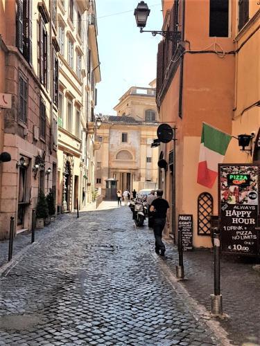 In Ancient Rome Apartment - Tap to explore photos