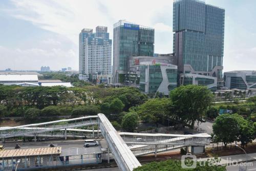 Nice and Cozy Studio at Tifolia Apartment By Travelio