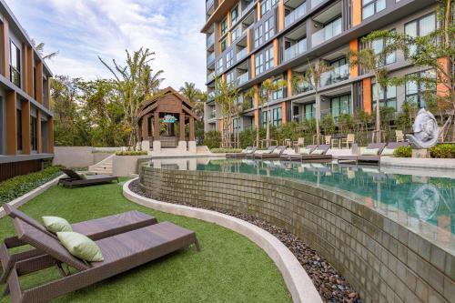 Panora Surin by Holy Cow, 1-BR, mountain view - Tap to explore photos