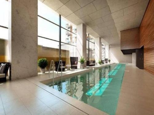 Sky High CBD Living with Resort style Amenities - Tap to explore photos